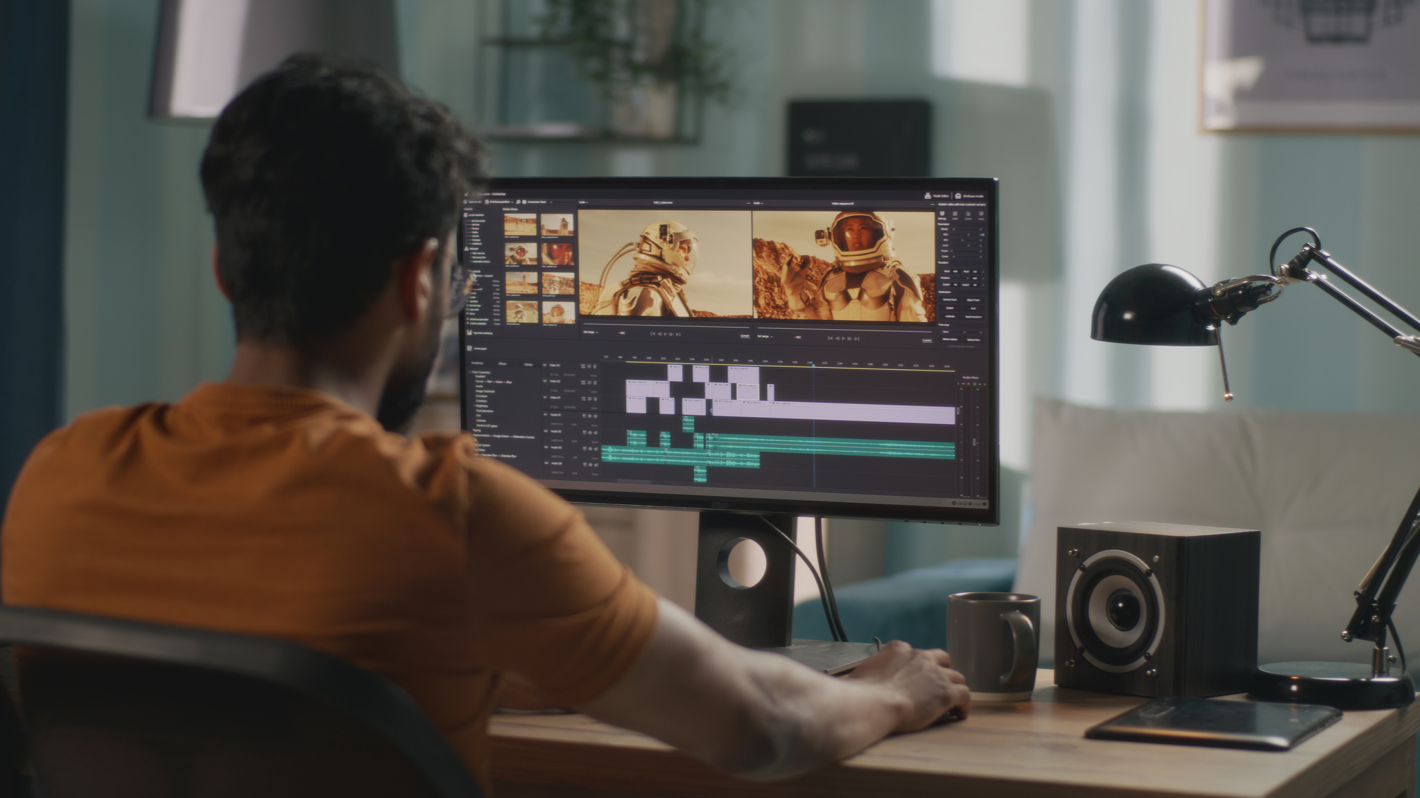 Unrecognizable guy editing astronaut video